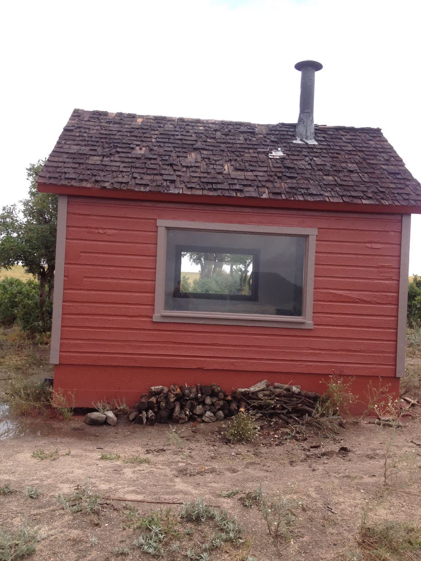 Restored red wood cabin on the Colorado prairie