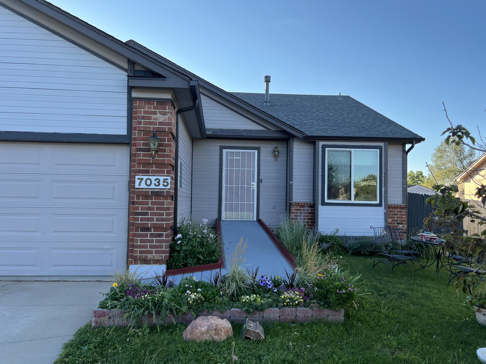 Crisp neighborhood home with refreshed exterior paint